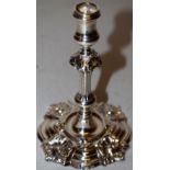 An early Victorian cast silver taperstick, in the earlier style of Paul de Lamerie, the campana
