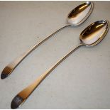 A pair of George III Scottish silver basting spoons, engraved an initial to the pointed ends,