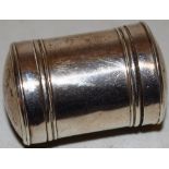 A George III silver cylindrical nutmeg grater, engraved initials to the hinged lid, 1.75in (4.