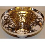 A modern design silver centrepiece bowl, with a detachable grill, 9in (23cm) Maker J M H, London