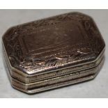 A George III small silver vinaigrette, rectangular with angled corners, the hinged lid with a leaf