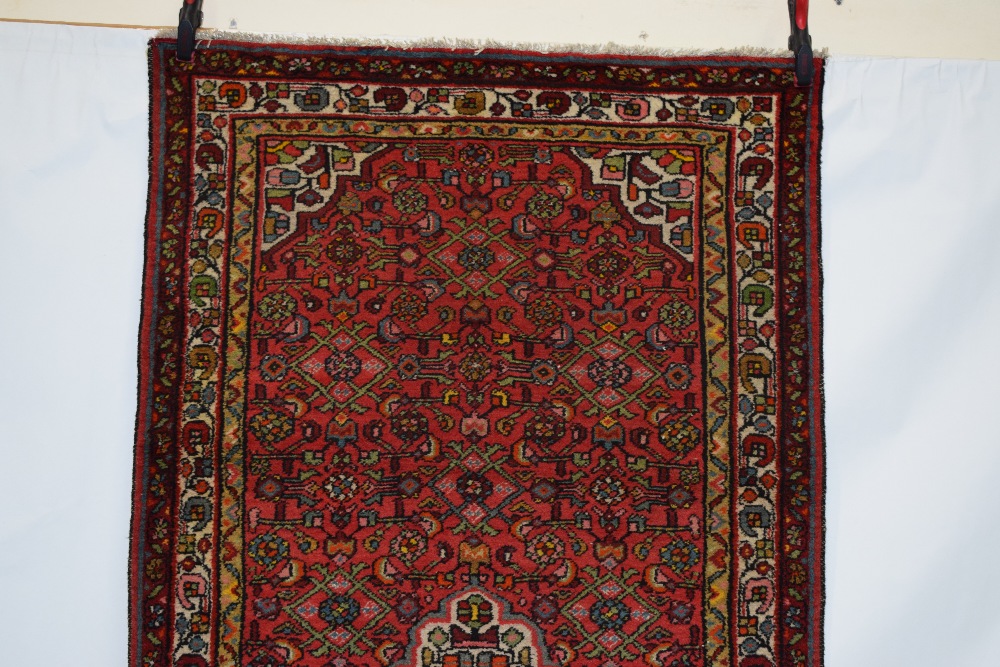 Hamadan rug, north west Persia, circa 1930s-40s, 7ft. 1in. x 3ft. 8in. 2.16m. x 1.12m. Red field - Image 6 of 10