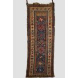 Kazak runner, south west Caucasus, early 20th century, 8ft. 9in. X 3ft. 2in. 2.67m. X 0.97m. Some