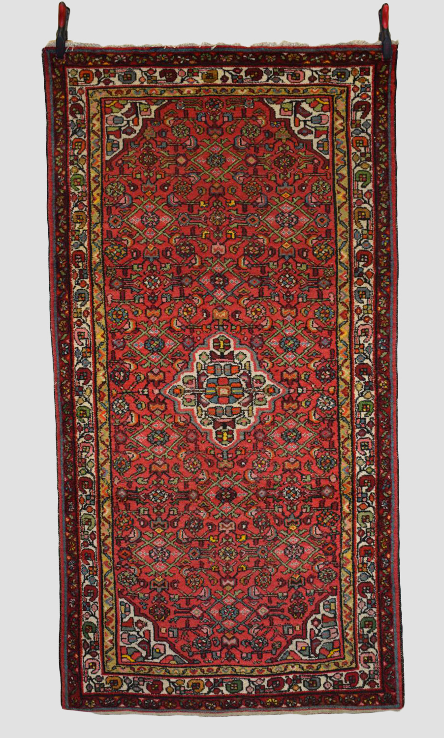 Hamadan rug, north west Persia, circa 1930s-40s, 7ft. 1in. x 3ft. 8in. 2.16m. x 1.12m. Red field