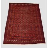 Afghan carpet of Turkmen design, Afghanistan, circa 1940s-50s, 9ft. 7in. X 6ft. 5in. 2.92m. X 1.96m.