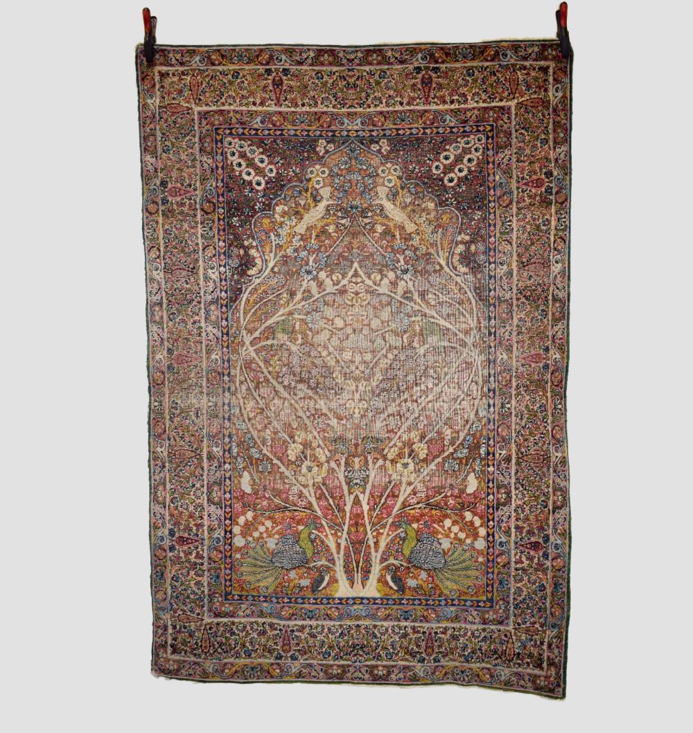 Lavar Kerman prayer rug, south east Persia, early 20th century, 6ft. 11in. X 4ft. 6in. 2.11m. X 1.