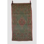 Indian rug, circa 1940s-50s, 5ft. 11in. x 3ft. 2in. 1.80m. x 0.97m. Some wear in places with