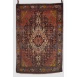 Hamadan rug, north west Persia, circa 1930s, 6ft. 7in. X 4ft. 7in. 2.01m. X 1.40m. Overall wear;