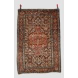 Saruk rug, north west Persia, circa 1940s, 5ft. 1in. X 3ft. 5in. 1.55m. X 1.04m. Old moth damage