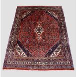 Hamadan carpet, north west Persia, circa 1950s 11ft. 10in. X 8ft. 8in. 3.60m. X 2.64m. Areas of moth