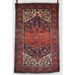 Hamadan rug, north west Persia, circa 1930s, 6ft. 6in. X 4ft. 2in. 1.98m. X 1.27m. Dark blue diamond