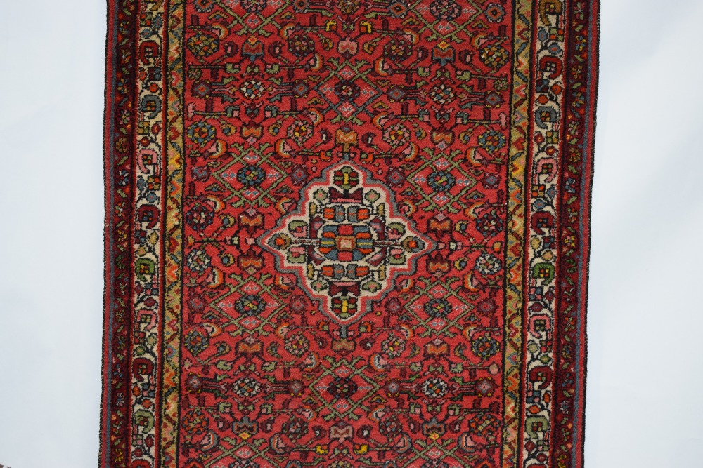 Hamadan rug, north west Persia, circa 1930s-40s, 7ft. 1in. x 3ft. 8in. 2.16m. x 1.12m. Red field - Image 7 of 10