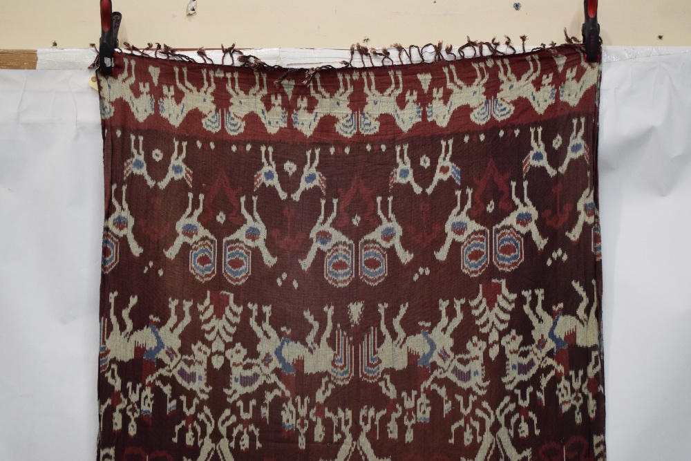 Three Indonesian textiles comprising:Two ikat hingii kombu (man's mantle), Sumba, east Indonesia, - Image 9 of 19