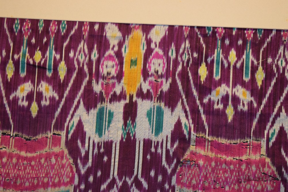 Rare large pictorial silk ikat fragment, depicting a row of pink and green tents across the centre - Image 9 of 13