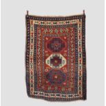 Kazak triple medallion rug, south west Caucasus, late 19th/early 20th century, 6ft. 7in. X 4ft.