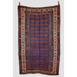 Kurdish rug, north west Persia, early 20th century, 6ft. 4in. X 5ft. 1.93m. X 1.52m. Overall wear;