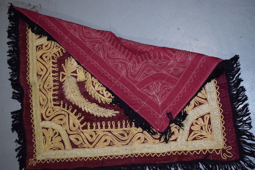 Two attractive Afghan red velvet metal thread embroidered dowry cloths, circa 1960s, each 33in. X - Image 7 of 8