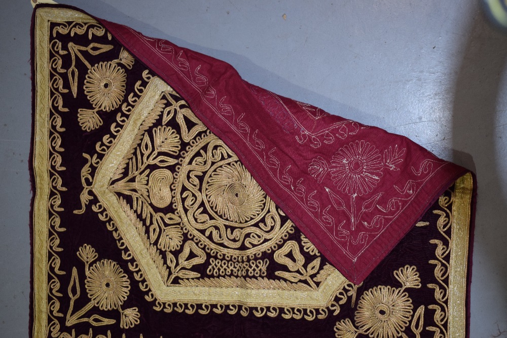 Two attractive Afghan red velvet metal thread embroidered dowry cloths, circa 1960s, each 33in. X - Image 8 of 8