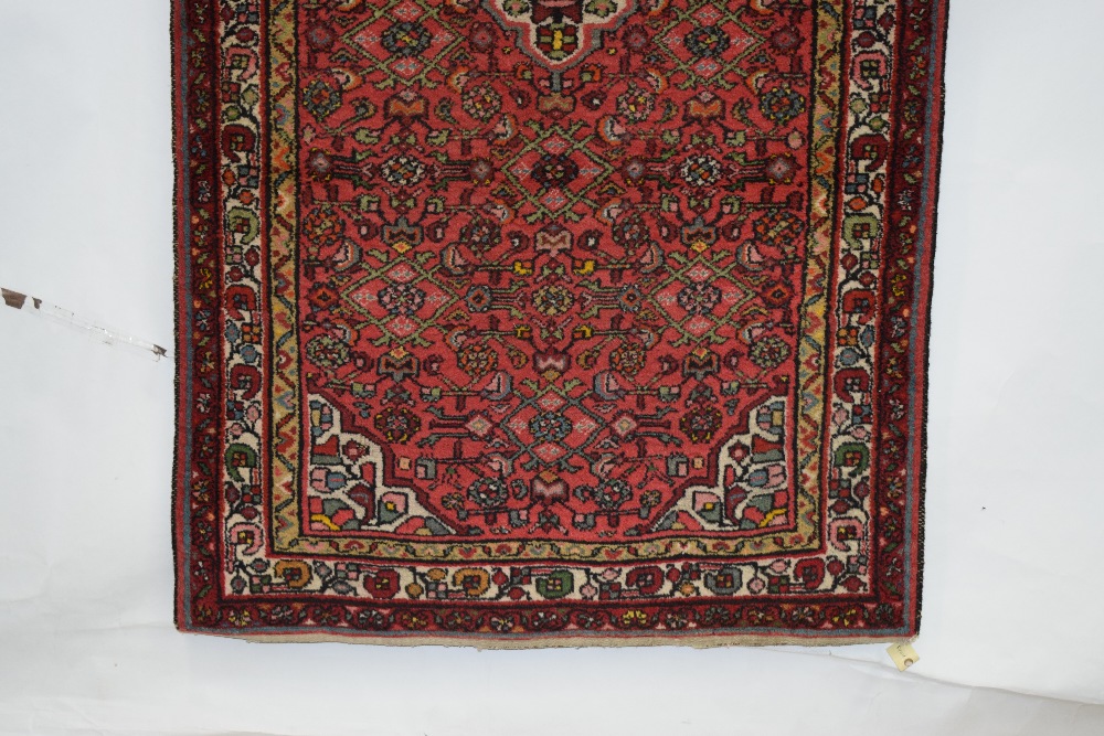 Hamadan rug, north west Persia, circa 1930s-40s, 7ft. 1in. x 3ft. 8in. 2.16m. x 1.12m. Red field - Image 8 of 10
