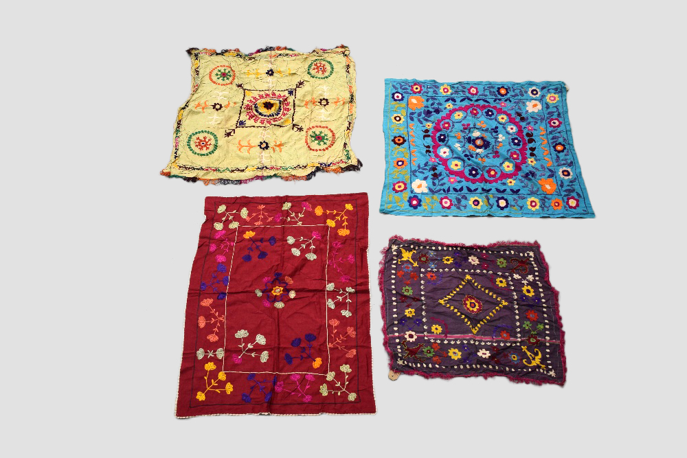 Ten small suzanis (one a fragment) by the Uzbeks of Afghanistan, circa 1930s-50s, various colours,