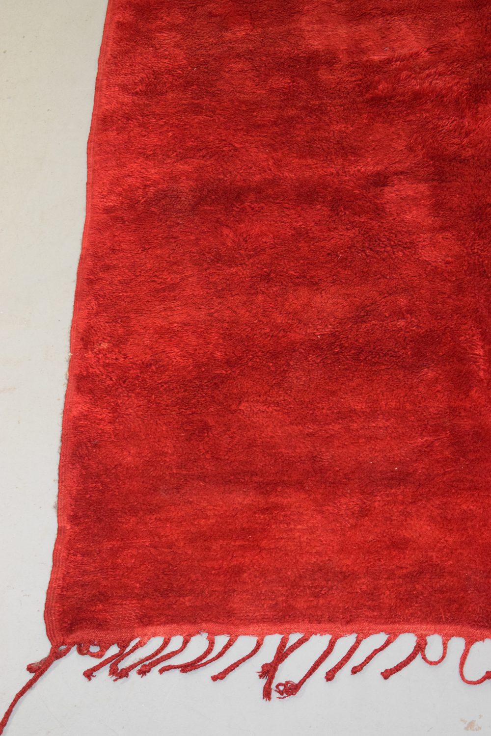 Plain red carpet by the Berbers of Morocco, mid-20th century, 9ft. X 5ft. 10in. 2.75m. X 1.78m. Long - Image 5 of 8