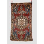 Kurdish rug, north west Persia, late 19th century, 6ft. 3in. X 3ft. 6in. 1.91m. X 1.07m. Overall