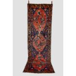 Caucasian long rug, Kuba district, north east Caucasus, early 20th century, 10ft. 11in. X 3ft.