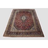 Kashan carpet, west Persia, second half 20th century, 13ft. 1in. X 9ft. 10in. 3.99m. X 3m. Red