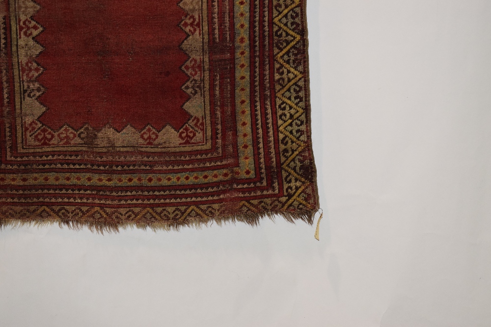 Four rugs comprising: the first, Anatolian prayer rug, probably Kirshehir district, early 20th - Image 6 of 29