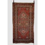 Two rugs, the first: Malayer rug, north west Persia, circa 1930s, 7ft. 4in. X 4ft. 2.24m. X 1.22m.
