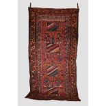 Afghan long rug, modern production, 9ft. 5in. X 4ft. 9in. 2.87m. X 1.45m. Some wear in places with