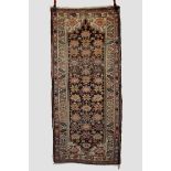 Kurdish long rug,, north west Persia, circa 1930s, 7ft. 7in. X 3ft. 4in. 2.31m. X 1.02m. Overall