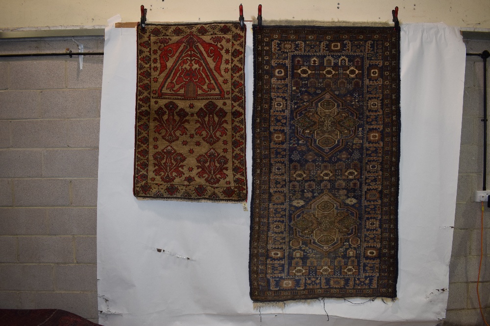 Four rugs comprising: the first, Anatolian prayer rug, probably Kirshehir district, early 20th - Image 11 of 29