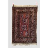 Afghan rug, second half 20th century, 6ft. 5in. X 4ft. 1in. 1.96m. X 1.25m. Light pinky-brown