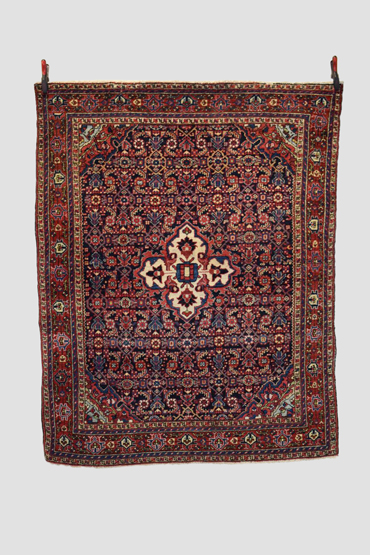 Hamadan rug, north west Persia, circa 1940s-50s, 6ft. 3in. X 5ft. 1.91m. X 1.52m. Dark blue field
