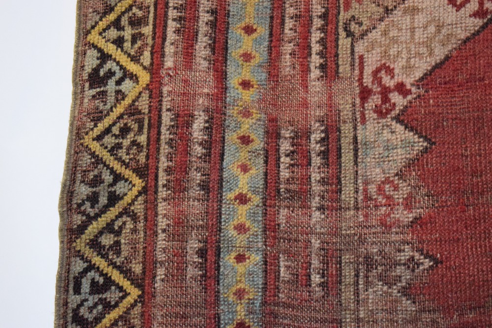 Four rugs comprising: the first, Anatolian prayer rug, probably Kirshehir district, early 20th - Image 8 of 29