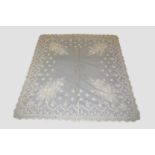 Superb quality Brussels needle lace veil worked with large bouquets of flowers to each corner,