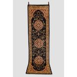 Nepalese runner, inner Asia, modern production, 10ft. 9in. X 3ft. 3.28m. X 0.91m. Dark brown/black