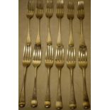 A set of seven Regency silver dessert forks, Old English pattern, Makers William Eley and William