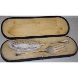 A pair of late Victorian silver fish servers, hanoverian pattern, the pierced fretwork oval blade