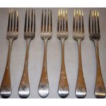 A set of six Regency West Country silver table forks, Old English pattern, engraved a crest with