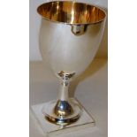 A George III silver goblet, the bowl gilded inside, on a square base stem foot, 6.5in (16.5cm)