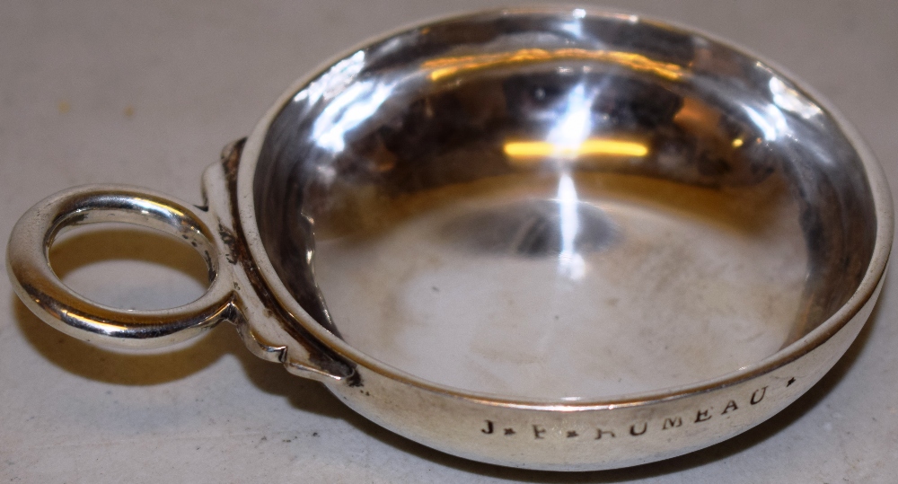 A French late eighteenth century silver wine taster, the rim inscribed with the owners name, a