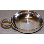 A French late eighteenth century silver wine taster, the rim inscribed with the owners name, a