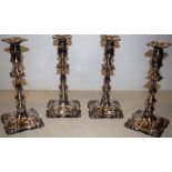 A set of four late Victorian Scottish candlesticks, silver on copper, in mid eighteenth century