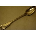 An early Victorian silver basting spoon, Kings Husk pattern, crested, Maker Elizabeth Eaton,