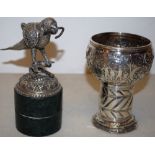 A Kashmiri silver coloured metal pocket watch stand, of a parrot mounted on a green stone circular