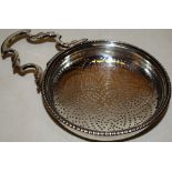 A George III silver lemon strainer, with side handle and clip, Maker William Plummer, London 1773,