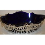 A German 800 standard silver oval bread basket, the serpentine outline pierced raised sides