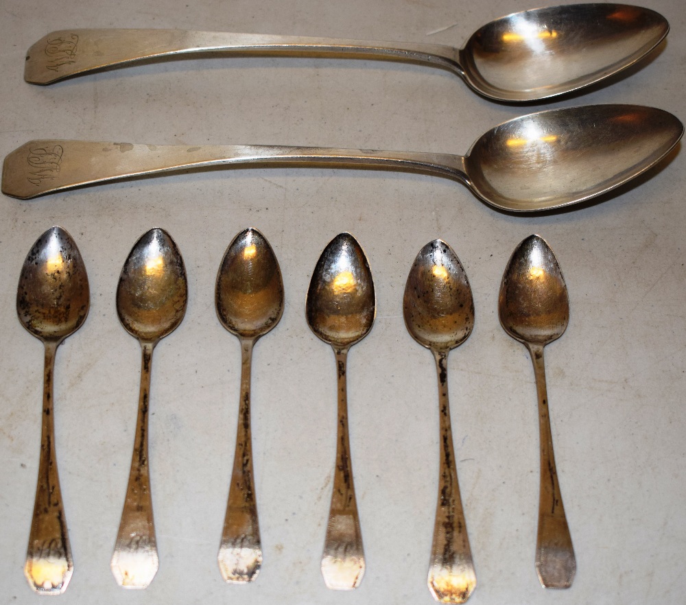 A pair of early nineteenth century North American coin silver table spoon, engraved initials to